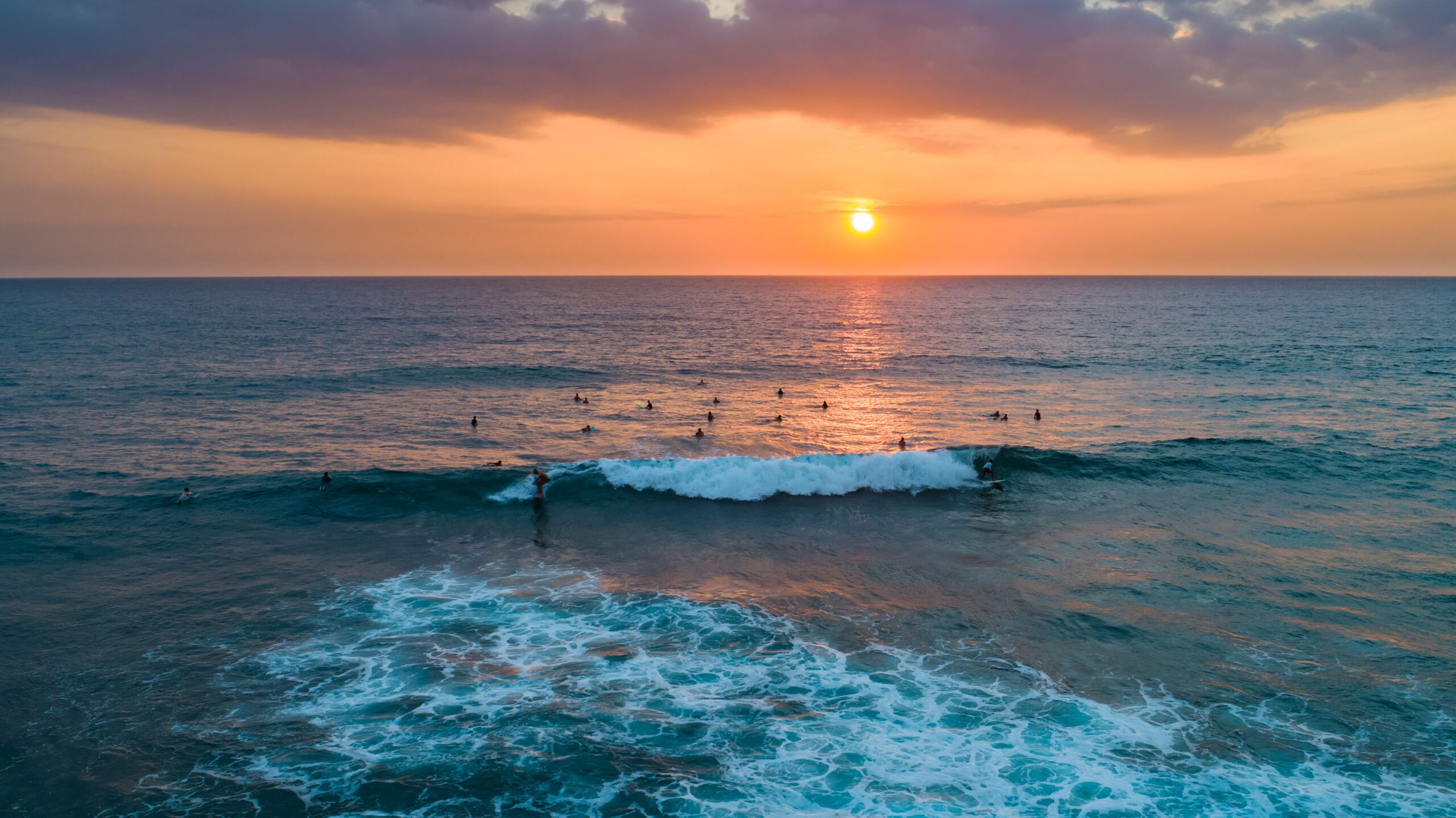 Aerial view of surfers near Hikkaduwa beach. Hikkaduwa, Sri Lanka.