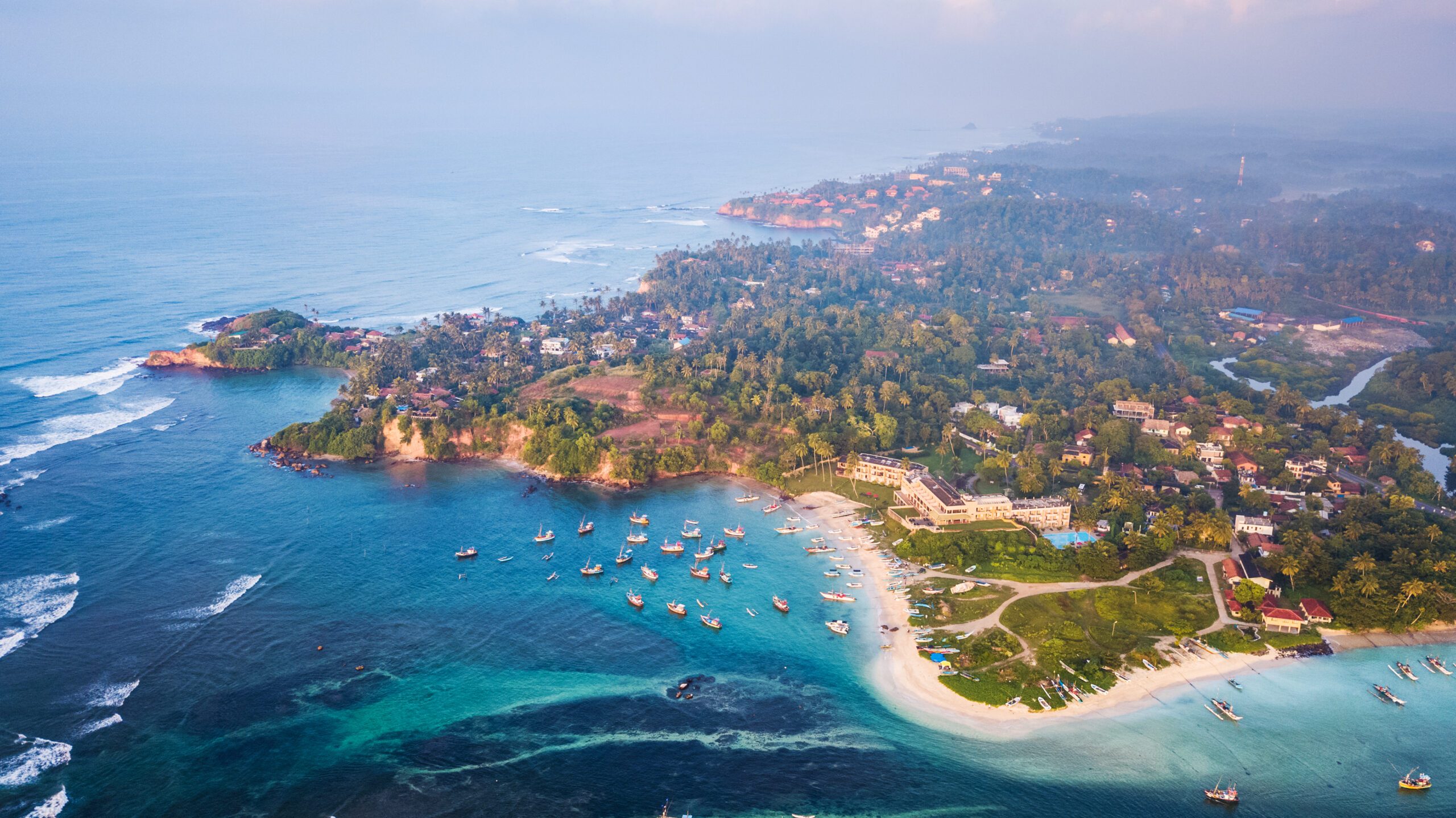 Aerial,View,Of,The,Weligama,Cape,With,Fishing,Village,At